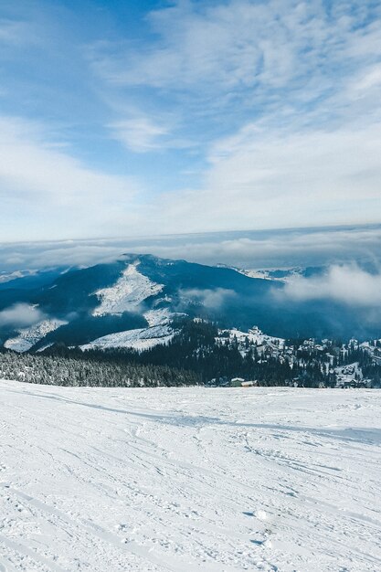 Landscape of snowed winter mountains copy space