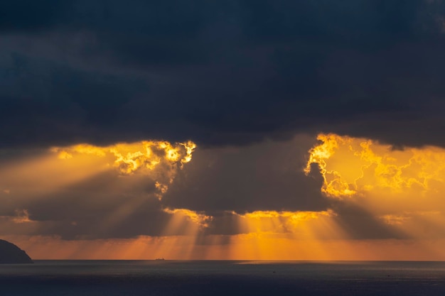 Landscape sunrise on Hon Chong cape Nha Trang Vietnam Morning sky clouds sun and sea water at dawn