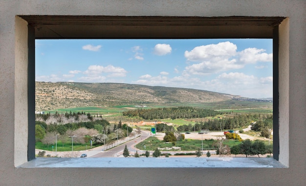 Landscape through  window in the wall, North of Israel