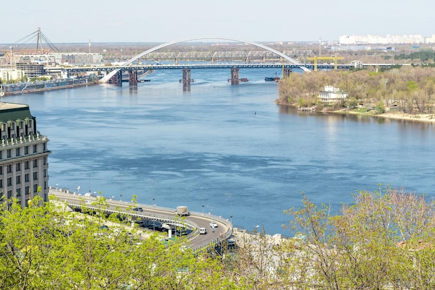 Landscape view of city with a bridge in Kyiv, Ukraine.