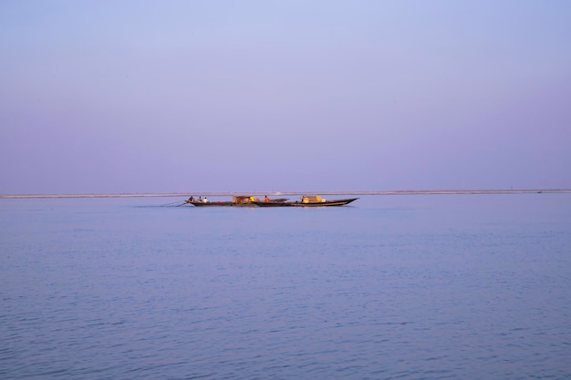 Landscape View of a fishing boat on the Padma river in Bangladesh