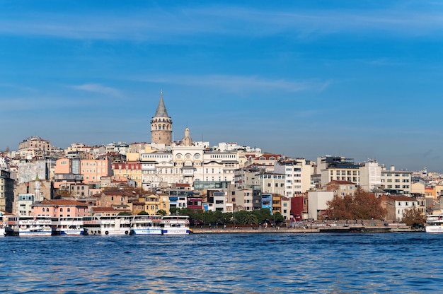 Landscape view on the galata tower under the blue autumn sky
