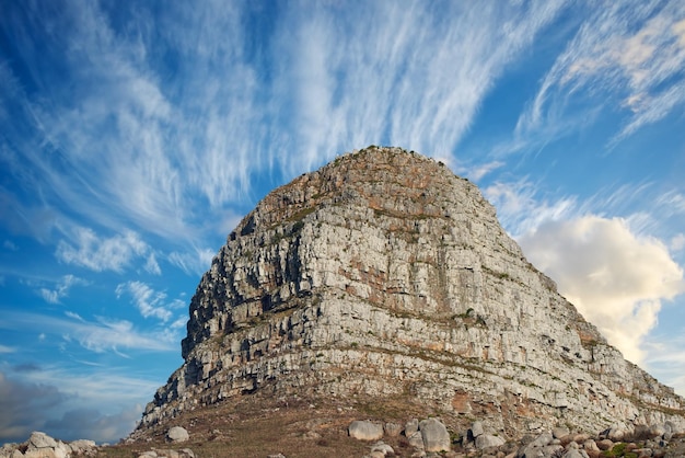 Landscape view wth blue sky copy space of Lions Head mountain in Cape Town South Africa Steep rough scenic and famous hiking terrain with cloudy sky background Reach the summit and enjoy the top