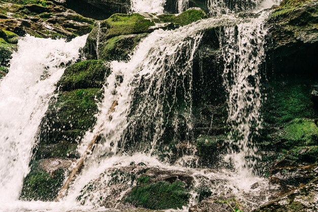 Landscape of the waterfall in the Mountains