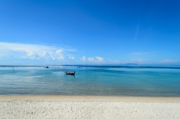 Landscape with boat and sea under the blue sky in the morning