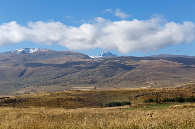 Landscape with mountains and clouds