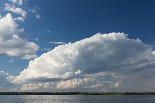 Landscape with river and cloudy sky