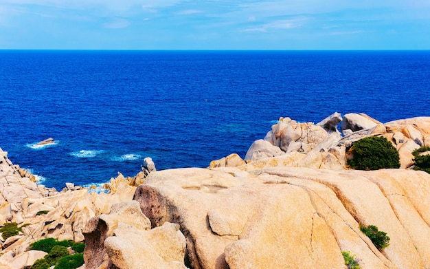 Landscape with Rocky coast of Capo Testa in Santa Teresa Gallura at the Mediterranean Sea on Sardinia Island in Summer Italy. Scenery of Cagliari province. Mixed media.