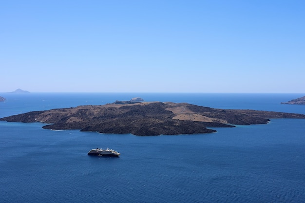 Landscape with santorini volcano nea kameni and sea cyclades greece