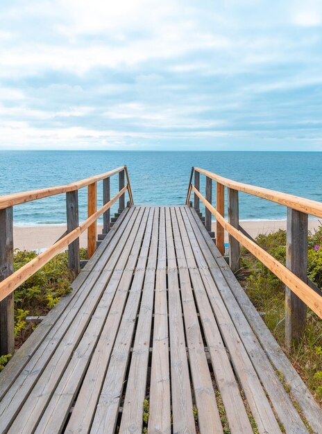 Landscape with wooden stairs leading to the beach on Sylt island in North Sea Germany