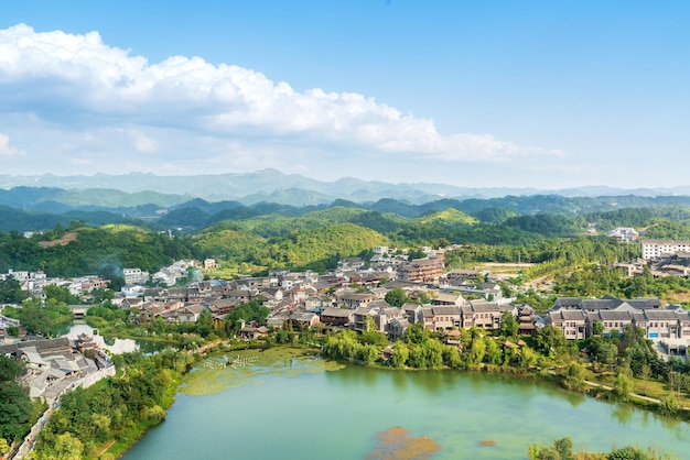 Landscape of wuyuan county with yellow oilseed rape field and\
blooming canola flowers in spring. it nears yellow mountain. it\'s\
very quiet. people refer it to as the most beautiful village of\
china.