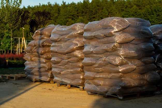 Landscaped oak bark in bags for sale outdoors