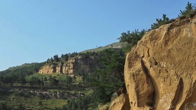 Landscapes, forest and ancient rocks on the slopes of the mountains surrounding city of Kislovodsk