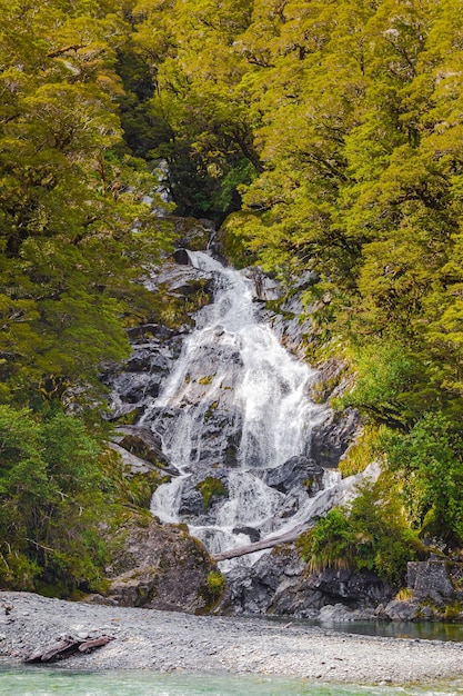 Landscapes of New Zealand Waterfall among the greenery South Island