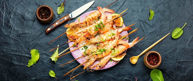 Langoustines or prawns on a skewer