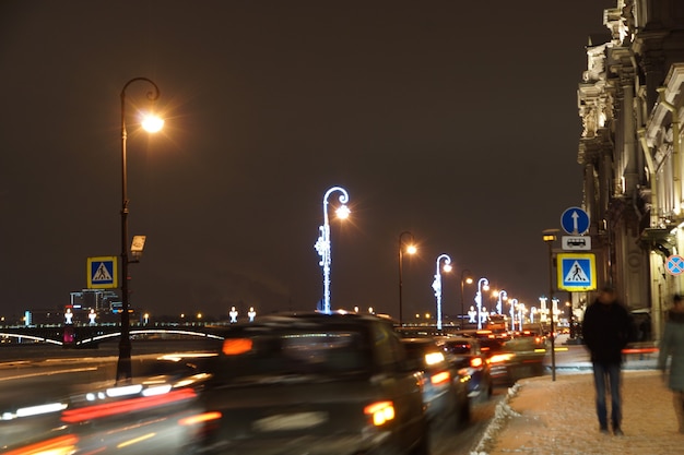 Lanterns decorated with garlands on the background of the festive city