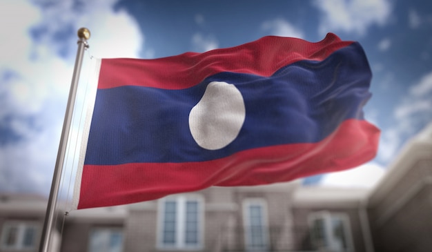 Laos Flag 3D Rendering on Blue Sky Building Background 