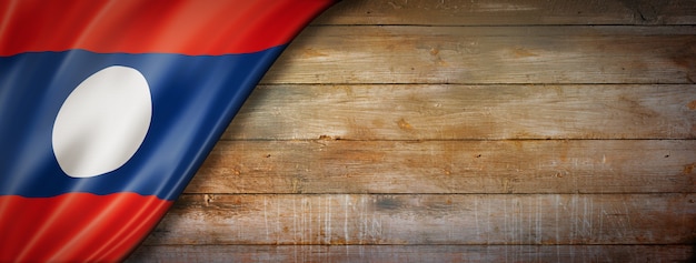 Laos flag on vintage wood wall