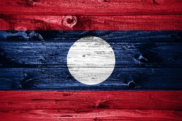 Laos flag on wooden planks background wood flag