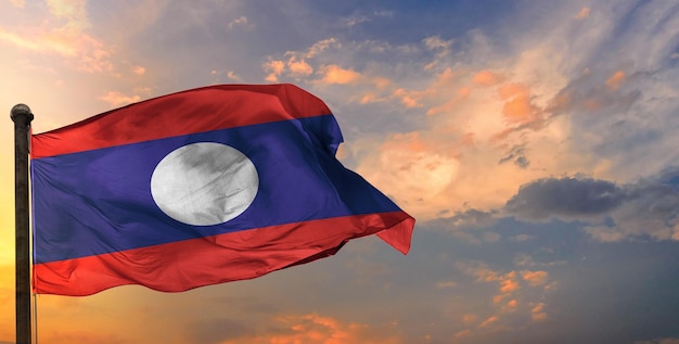 The laos waving flag and sky background.