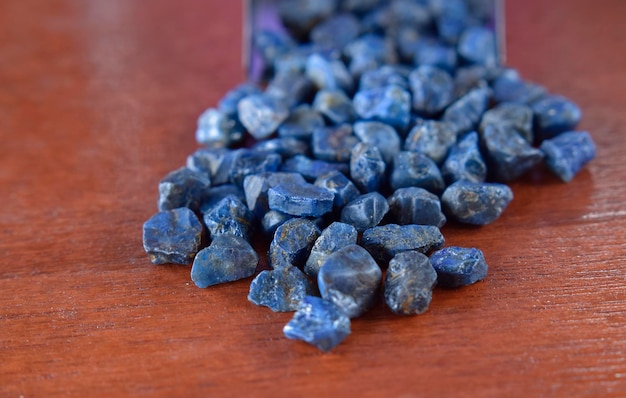 Lapis Is a beautiful natural gemstone on a wooden floor