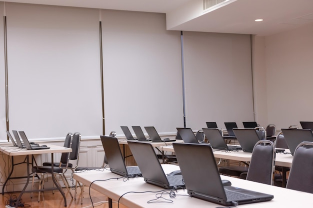 Laptop arranging rows in computer classroom