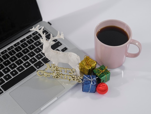 Laptop coffee and Christmas decorations