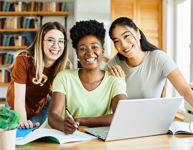 Laptop computer girl woman home technology female internet young office business lifestyle student happy communication diversity teamwork multiethnic friend