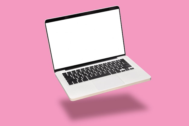 Laptop computer mock up with empty blank white screen isolated on pink background.