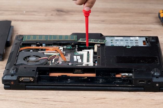 The laptop computer was dismantled to repair internal equipment.