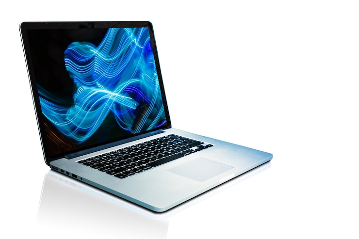 Laptop computer with abstract background on monitor. High quality photo