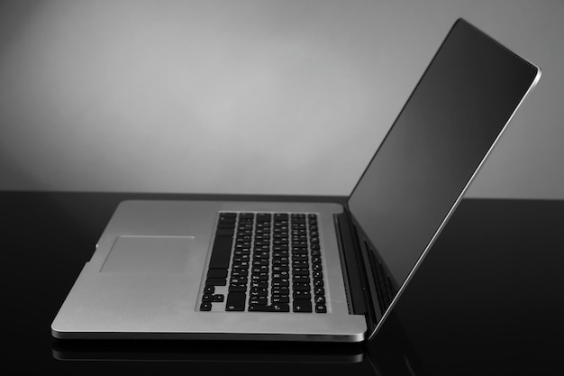 Laptop on gray background