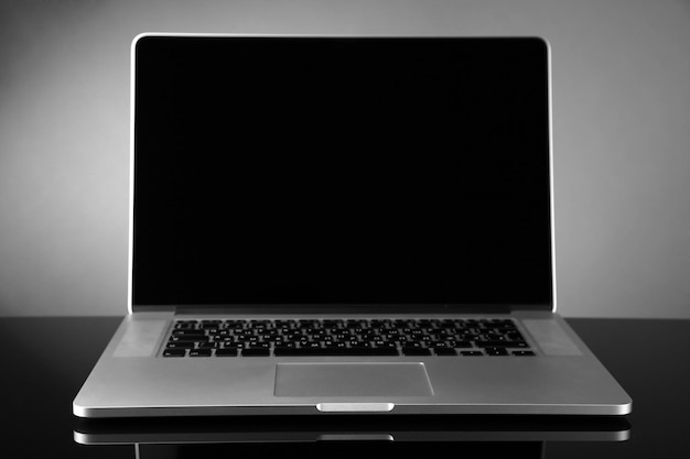 Photo laptop on gray background