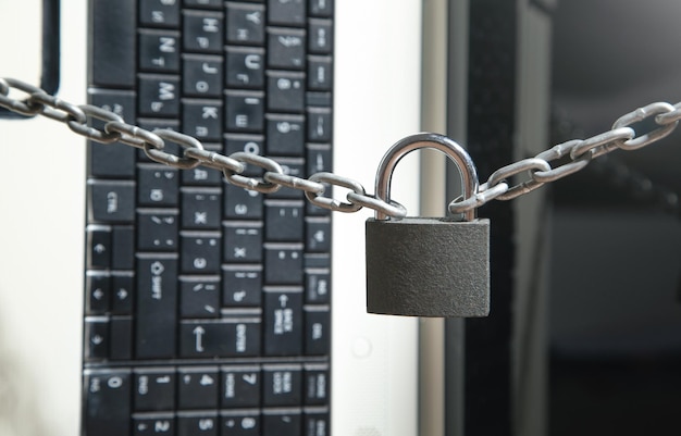 Laptop locked with chains and padlock