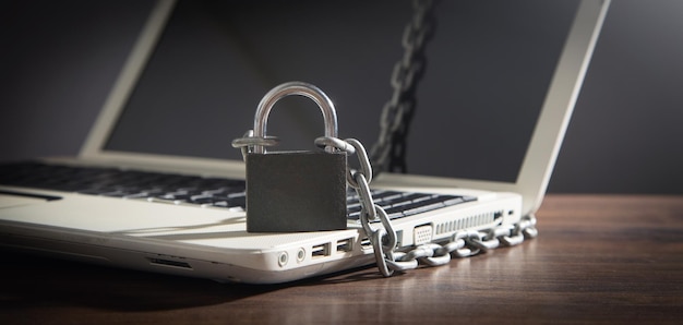 Laptop locked with chains and padlock