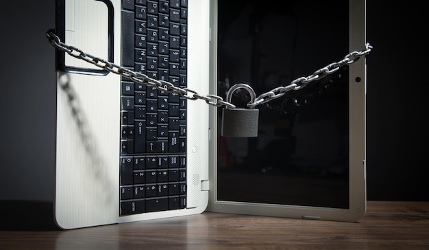 Laptop locked with chains and padlock