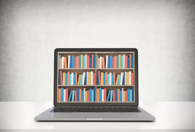 Laptop met boekenplanken op een betonnen muur