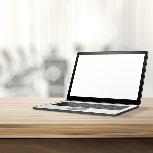 Laptop met leeg scherm op houten tafel en onscherpe achtergrond
