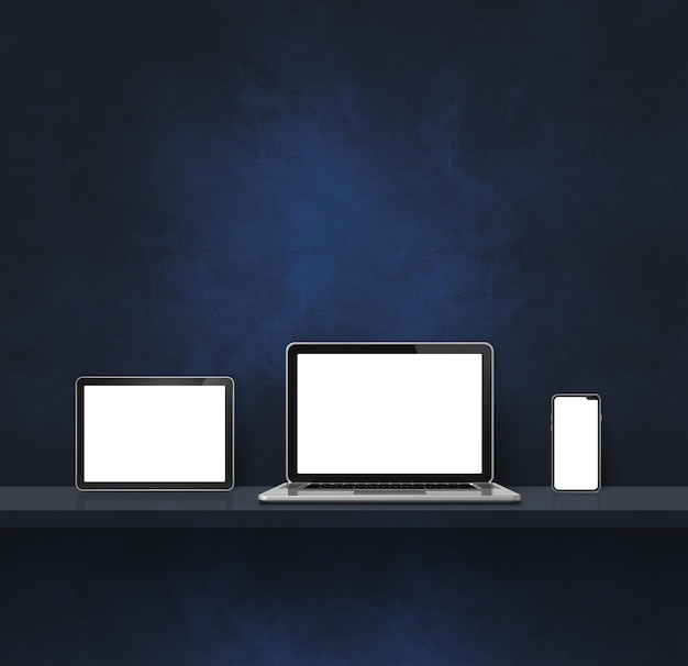 Photo laptop mobile phone and digital tablet pc on black wall shelf square background