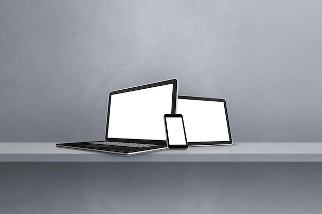 Ноутбук, мобильный телефон и цифровой планшетный компьютер на серой настенной полке Горизонтальный фон