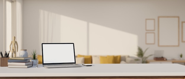 A laptop mockup is on a white tabletop in a modern and cozy apartment living room