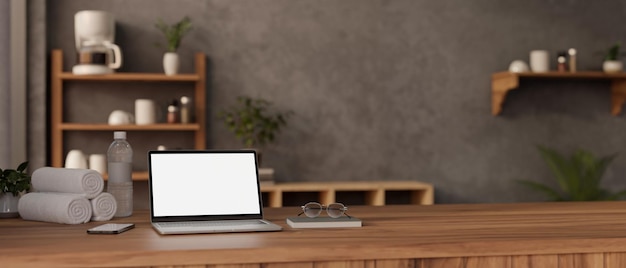 Laptop mockup on wooden counter bar in modern loft kitchen or snack bar