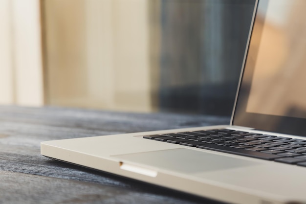 Laptop on modern wooden desk