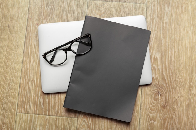 Laptop, notebook on work wooden desk 