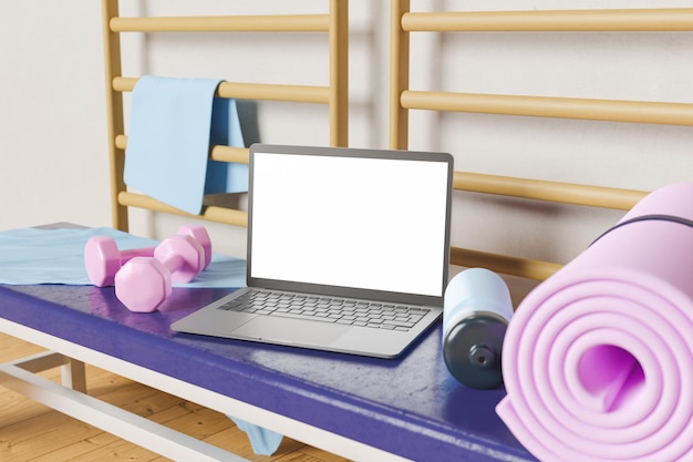 laptop op een sportschoolbankje met fitnessapparatuur eromheen