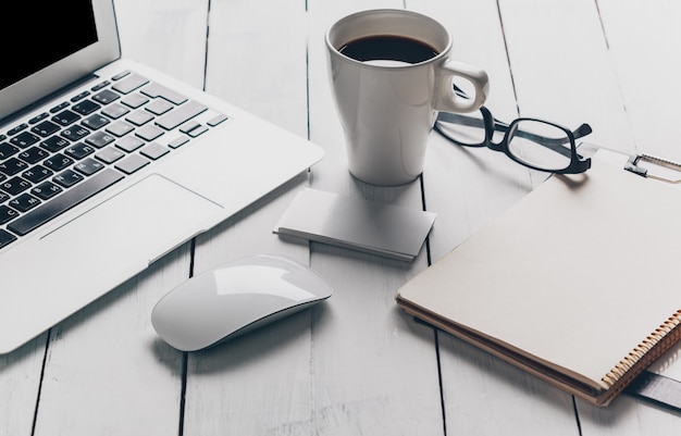 Laptop and other electronics on workspace