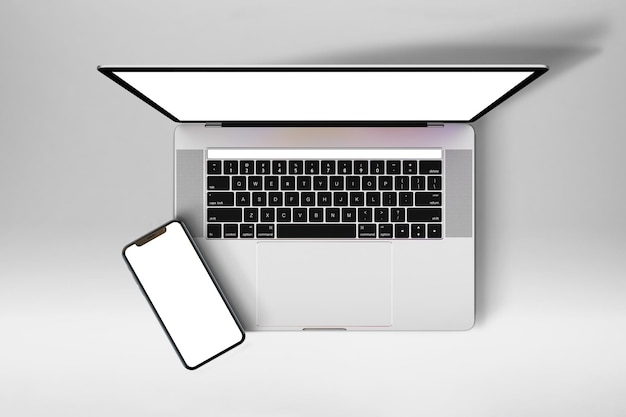 Photo laptop and phone top side isolated in white background