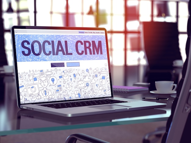 Laptop Screen with Social CRM website.