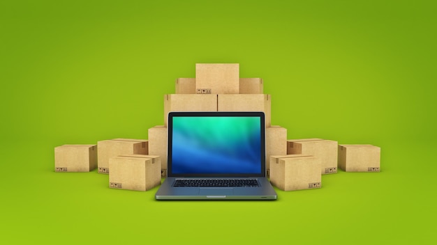 A laptop sits in front of a stack of cardboard boxes.