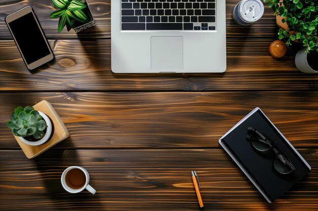 a laptop sits on a table with a cup of coffee and a cup of coffee